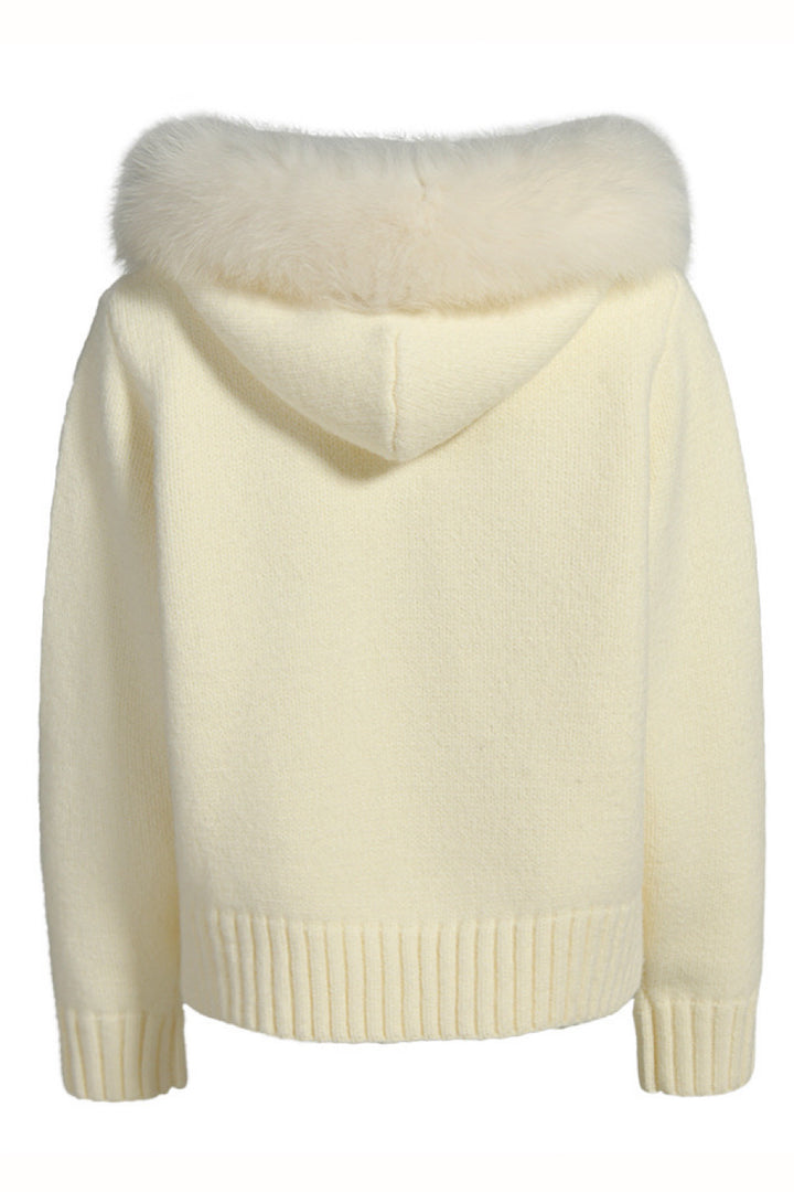 Refined ivory cashmere jacket with voluminous fox fur details, ideal for cozy yet elegant loungewear.