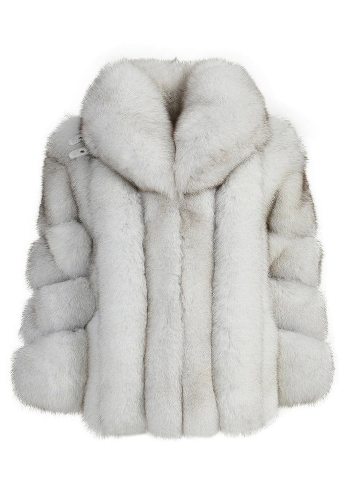 This exquisite natural white fox fur coat showcases a dramatic maxi collar, perfect for making a bold statement during winter events.